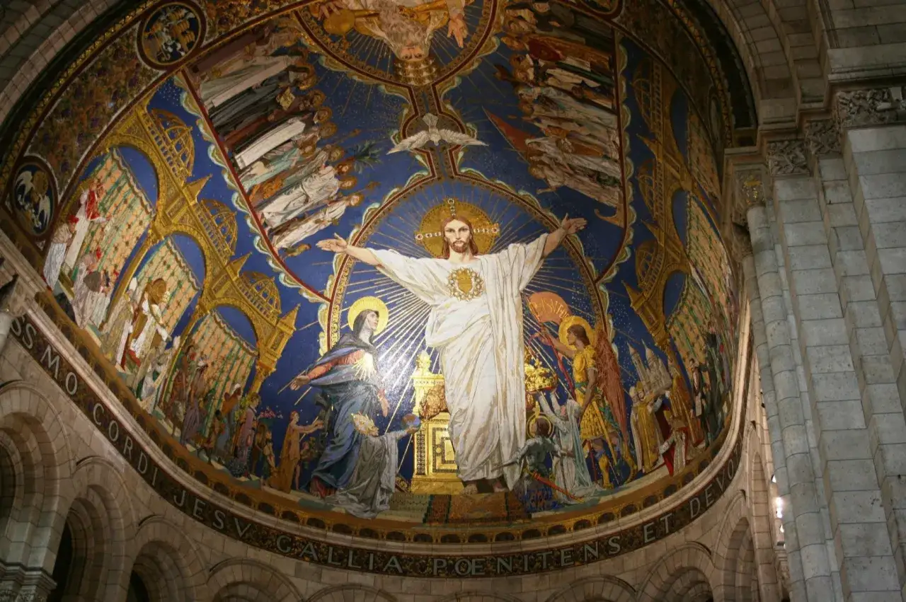 Wspaniały fresk w bazylice Sacré-Cœur przedstawia Chrystusa w otoczeniu świętych i aniołów.